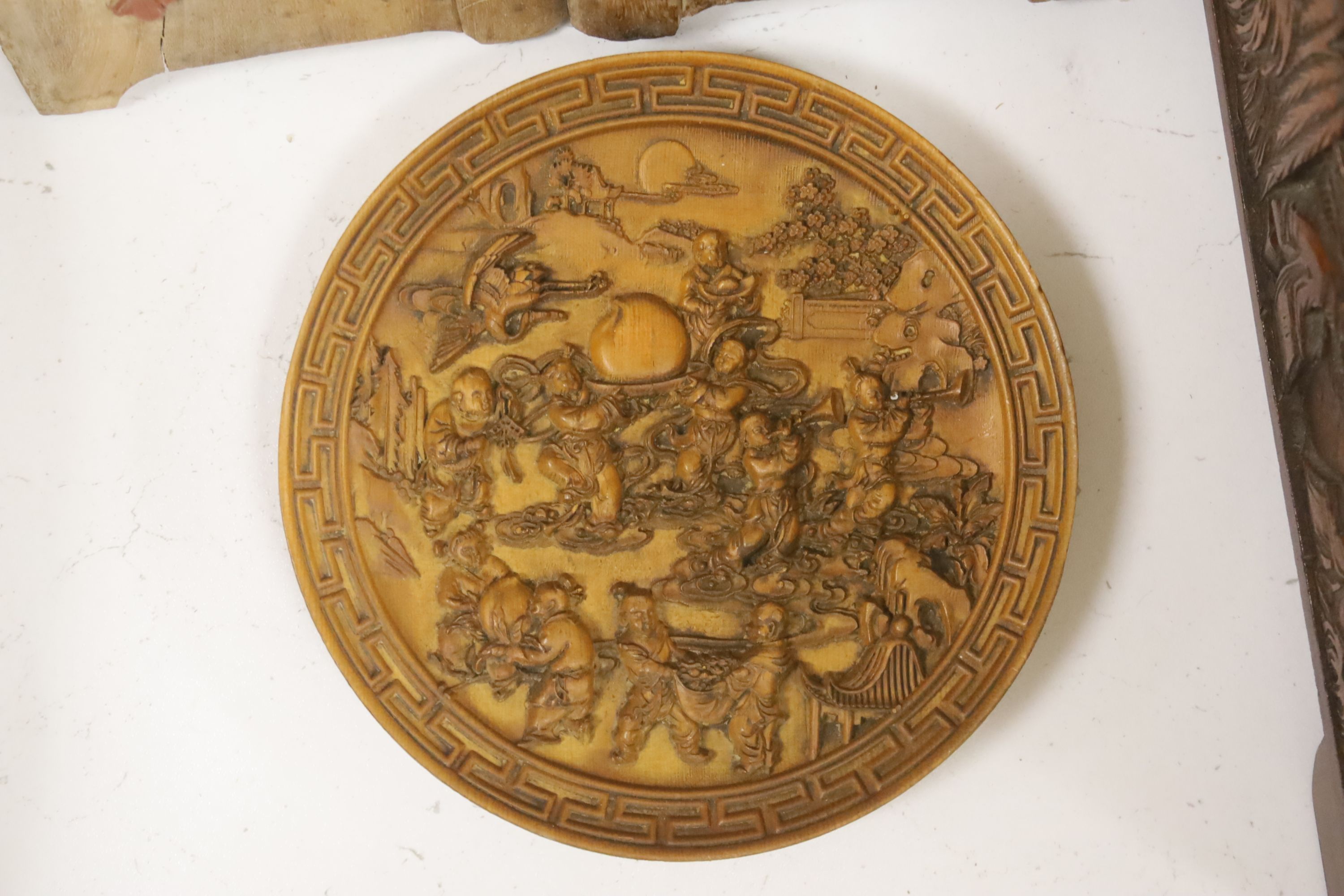 A quantity of 20th century Chinese carved bamboo and wooden effects to include a large brush pot, 17cm high (7)